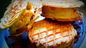 Iranian traditional icecream: frozen clotted cream sandwiched between two thin crispy waffles.